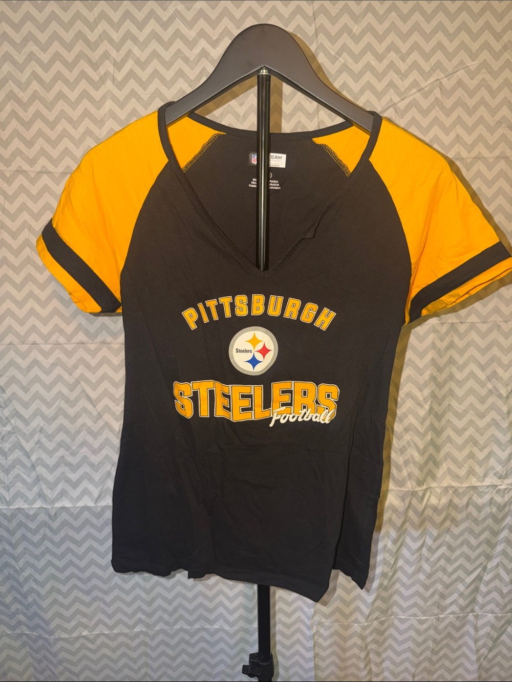 NFL Pittsburgh Steelers Women's Short Sleeve V-Neck Tee Black and Gold